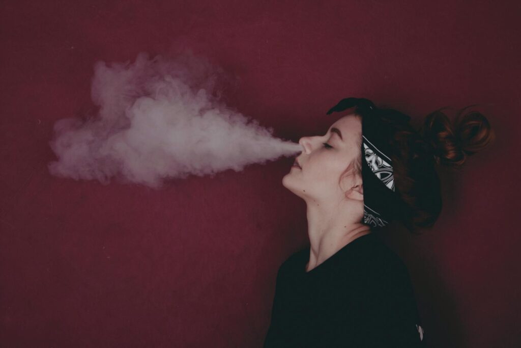 Woman in Black Shirt Smoking