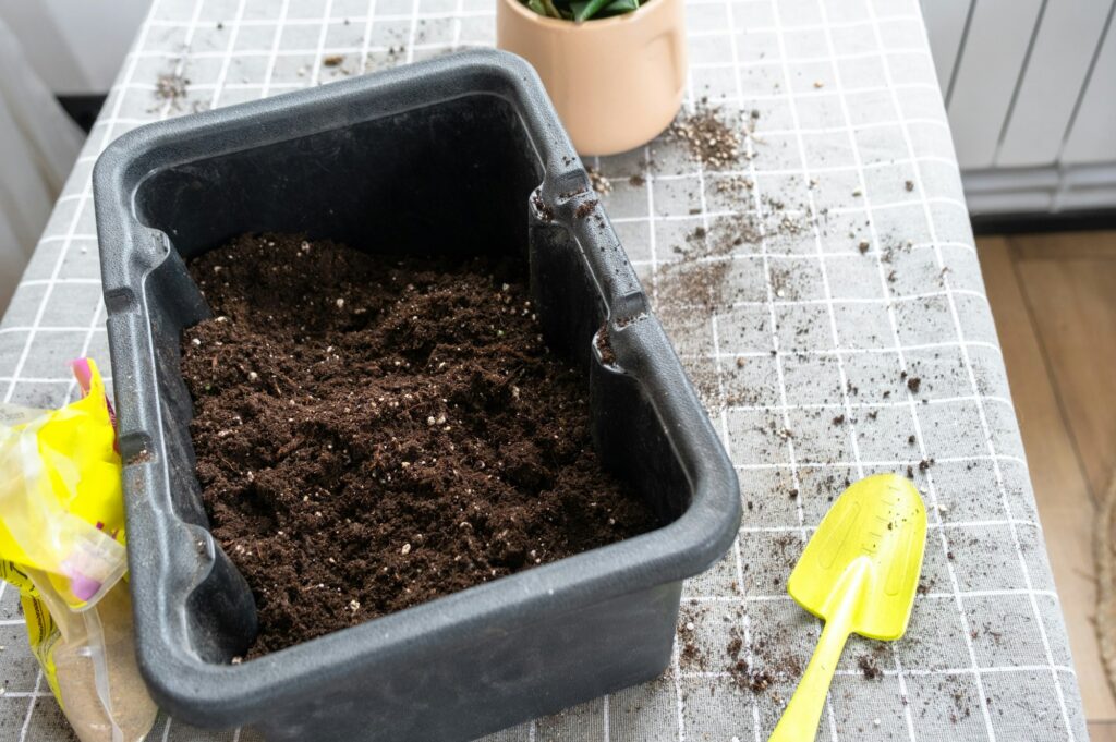 Ingredients for the soil of home potted plants, peat, earth, sand, perlite, vermiculite, coconut. A