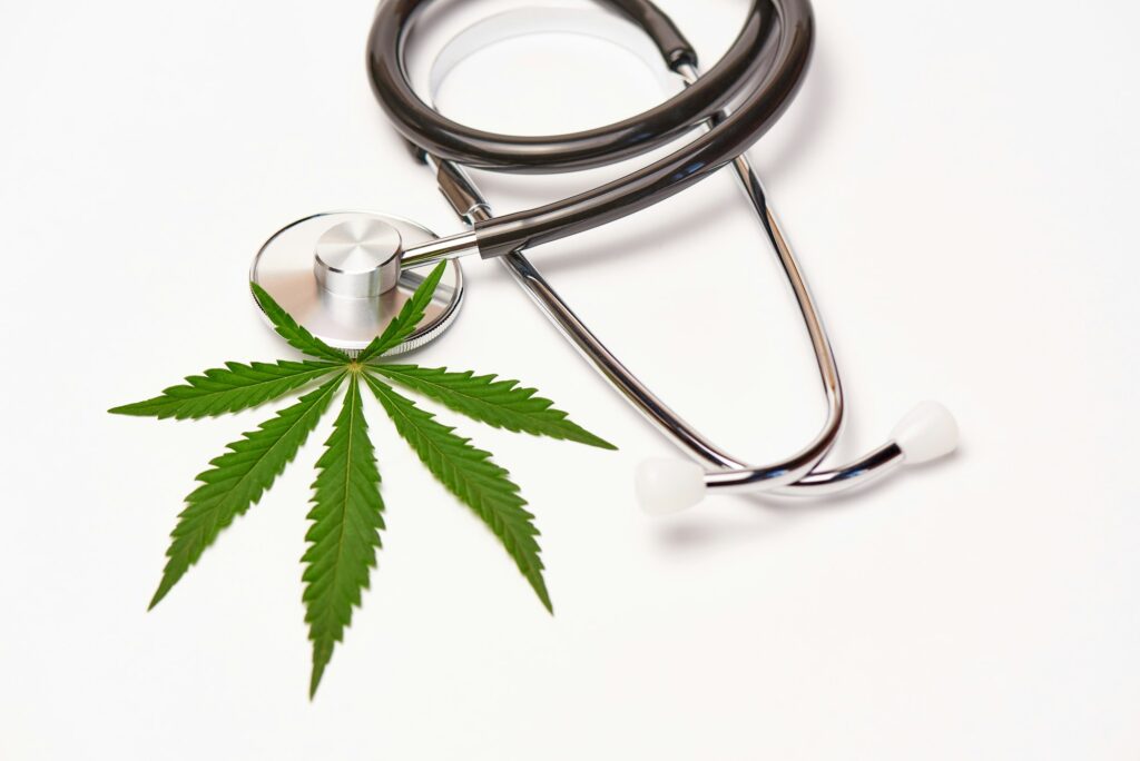 Stethoscope and cannabis leaf